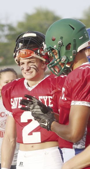 Corry’s Elijah Eckonen (2) is with Union City’s Miles Parker.